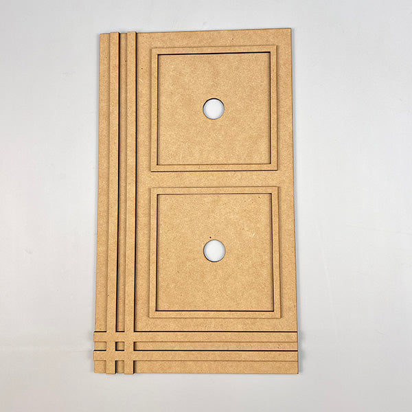 Introducing the Farmhouse Trim Interchangeable Squares Holder from Janet's Craft Corner: This wooden panel features two interchangeable squares for easy customization and vertical decorative lines on the left side, reminiscent of classic farmhouse trim. Each square boasts a circular hole in the center, set against a plain light surface, making it perfect for your versatile DIY projects.