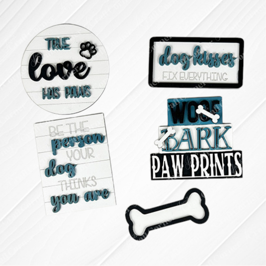 Create the ultimate dog lover decor with Janet's Craft Corner's Dog Lover Tiered Tray Kit. This kit includes charming phrases such as "True love has paws" and "Dog kisses fix everything," accompanied by a paw print banner and bone-shaped decorations in stylish black, white, and teal. It's the perfect DIY home decor project for any enthusiast looking to add a canine touch to their crafts.