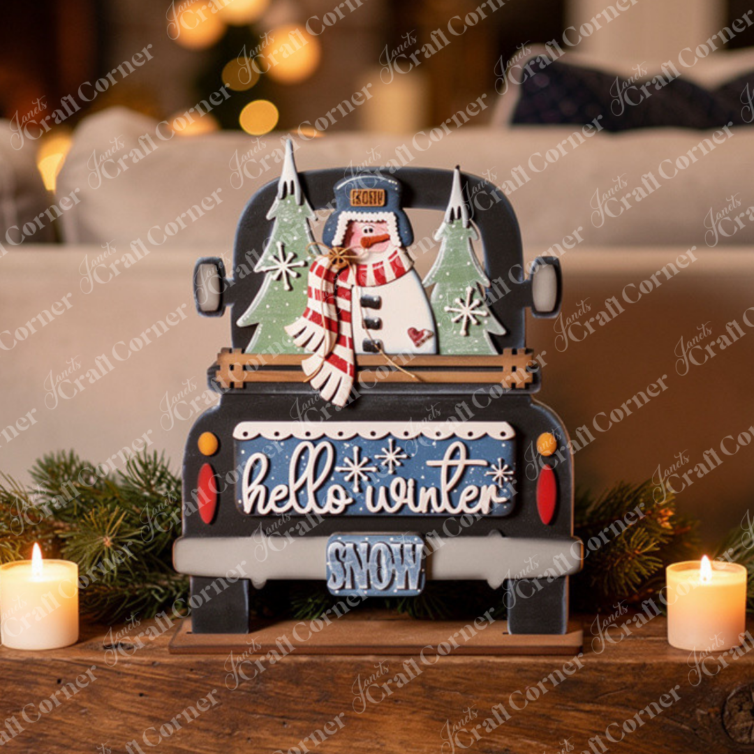 Add a touch of festive cheer to your home with Janet’s Craft Corner’s Hello Winter Snowman Interchangeable Insert—a DIY seasonal home decor craft kit featuring three unfinished wood pieces: a charming truck carrying a snowman, winter trees, and snowflakes, complete with “hello winter” and “SNOW” signs. Perfect for displaying with candles and greenery as an interchangeable seasonal accent.