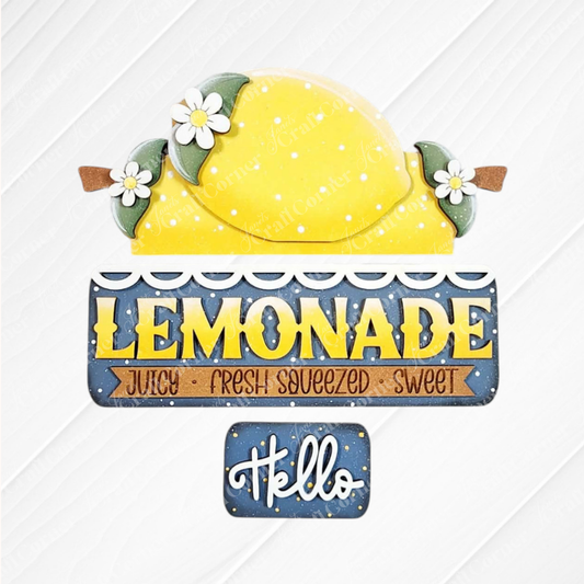 The Lemon Interchangeable Insert by Janet's Craft Corner is a DIY seasonal home decor craft kit featuring an unfinished wood sign with a yellow lemon, white flowers, green leaves, and phrases like “LEMONADE,” “juicy,” and “fresh squeezed.” 1 set of 3 pieces.