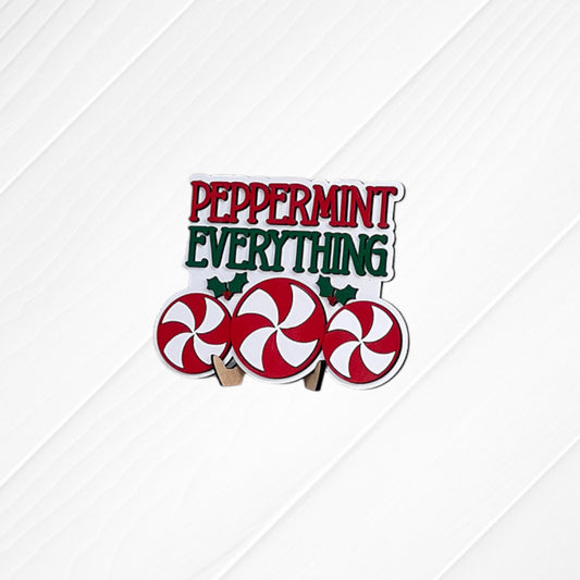 Heartland Peppermint Mocha Mini Shelf Sitters – Painted: Features the words “Peppermint Everything” above three red and white peppermint candies, accented with small green holly leaves on a white wood background—ideal for adding a festive touch to your Peppermint Mocha decor or including in your DIY home decor kit.