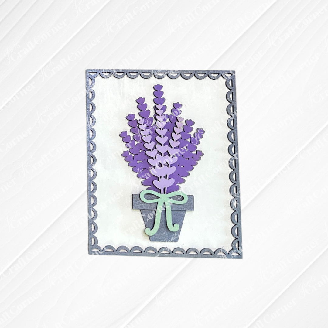 The Lavender Switchable Farmhouse Sign by Janet's Craft Corner is a DIY seasonal home decor craft kit featuring layered purple and lavender accents, green ribbon, and a scalloped blue border—perfect for small spaces. Set of 1.