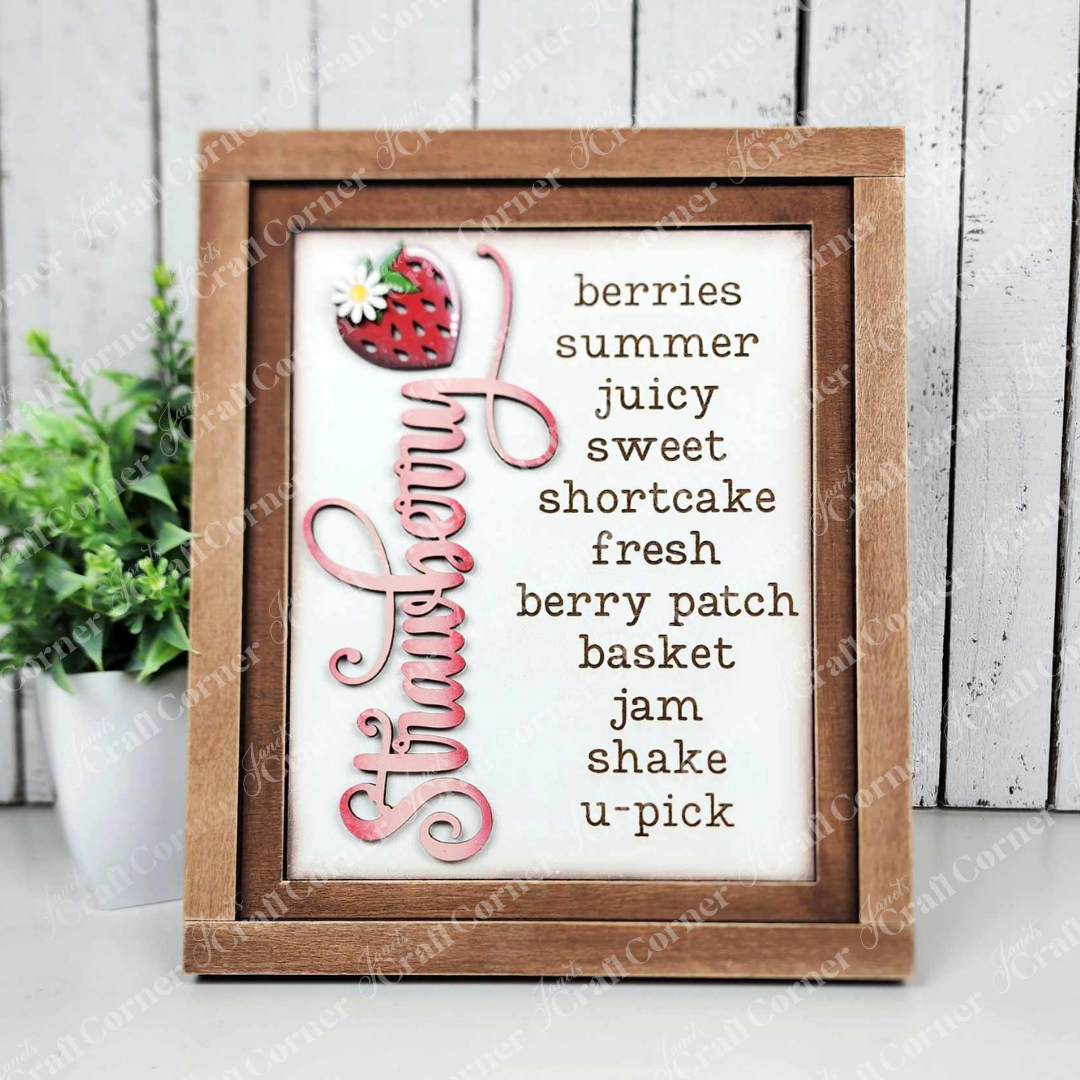 Janet's Craft Corner Strawberry Farmhouse Sign DIY kit: laser-cut wooden panel featuring strawberry, flower, leaves & seeds in a decorative pattern—ideal for making your own seasonal home decor.
