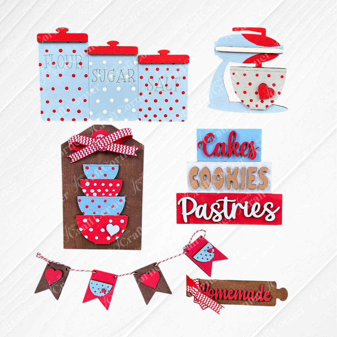Add a touch of rustic charm to your farmhouse decor with Janet's Craft Corner's Baking - Tiered Tray Kit. This delightful kitchen-themed display features red, blue, and wooden accents, complete with miniature cookware, and canisters labeled "Flour" and "Sugar." It also includes signs for "Cakes," "Cookies," and "Pastries," all finished with charming red polka dot motifs.