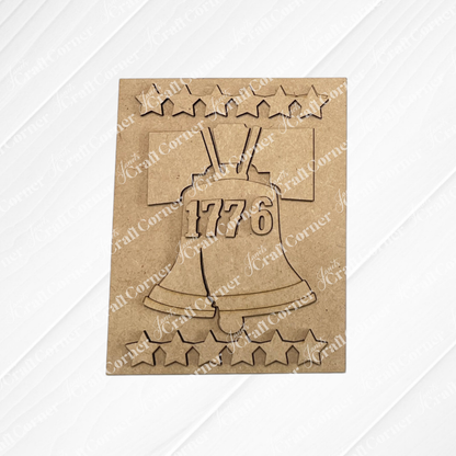 Celebrate American Independence with Janet's Craft Corner Patriotic Farmhouse Signs—a DIY craft kit featuring a laser-cut Liberty Bell with "1776" and stars, perfect tiered tray or farmhouse decor. Set of 1.
