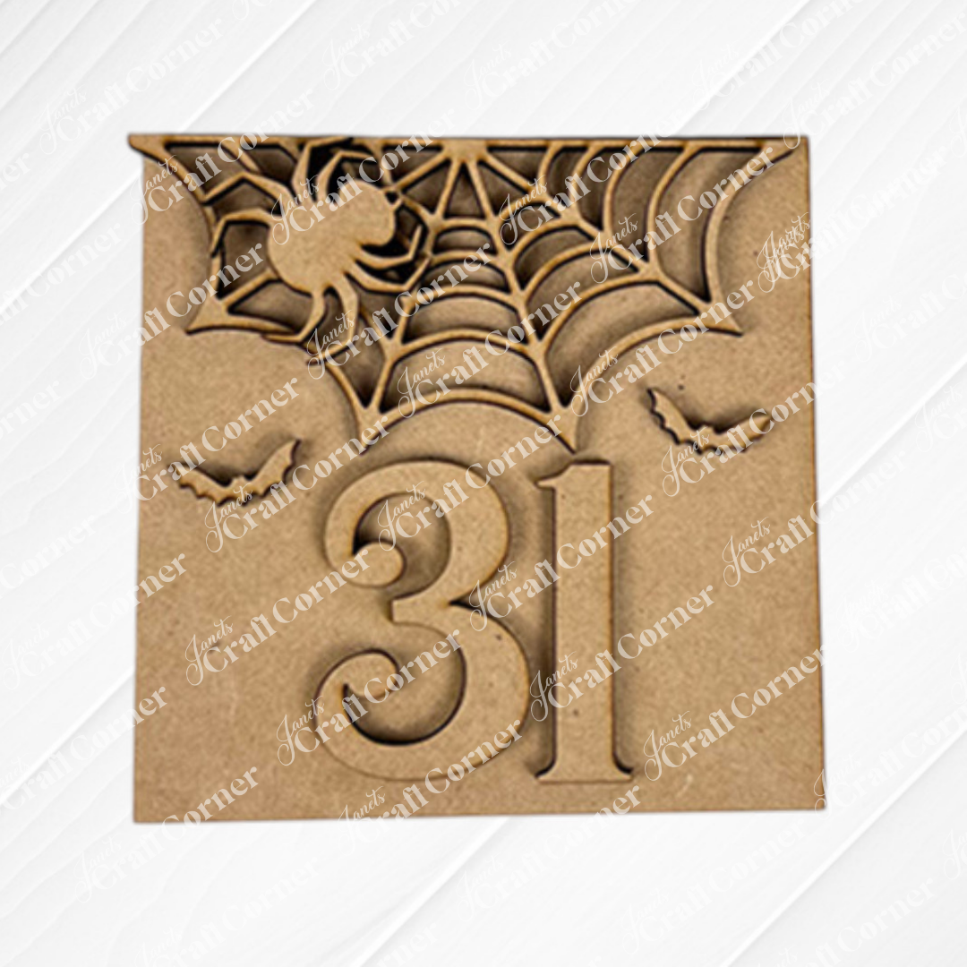 The Oct 31 Squares by Janet's Craft Corner is a brown cardboard piece with a cut-out spider web, bats, and "31"—ideal for tiered tray decor or as a festive addition to your Swappable Squares collection for Halloween.