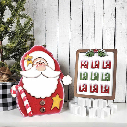 Add a festive touch with Janet's Craft Corner Fa La La Shelf Sitter DIY kit—includes Santa holding a candy cane and a red & green “Fa La La” sign, perfect seasonal home decor for your shelf or mantel. Set of 1.