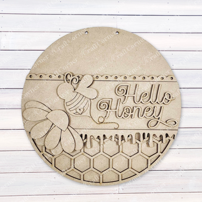 The Hello Honey Wall Hanger by Janet's Craft Corner is a charming round wooden sign featuring a bee, daisy, and honeycomb pattern. With "Hello Honey" engraved on the upper half and horizontal planks in the background, it's perfect for home decor or as a DIY craft kit to brighten your space.