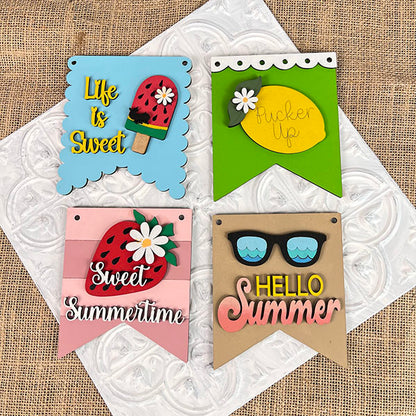 Enhance your home decor with Janet's Craft Corner's vibrant Summer Mini Signs. This delightful set features four wooden signs celebrating the joys of summer: a "Life is Sweet" popsicle design, a zesty lemon "Pucker Up," a strawberry-themed "Sweet Summertime," and a whimsical "Hello Summer" complete with sunglasses. These charming signs are perfect for adorning any woven surface.