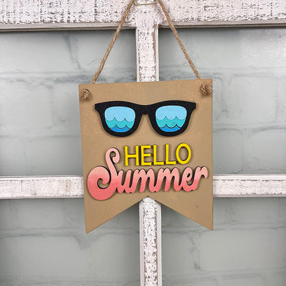 From Janet's Craft Corner, the Summer Mini Signs collection features a charming decorative sign that hangs on a rope. It displays "Hello Summer" in vibrant yellow and pink lettering, accentuated by black sunglasses with blue lenses. The sign has a light wood panel background adorned with a white grid pattern resembling a window, making it an ideal addition to your home decor.