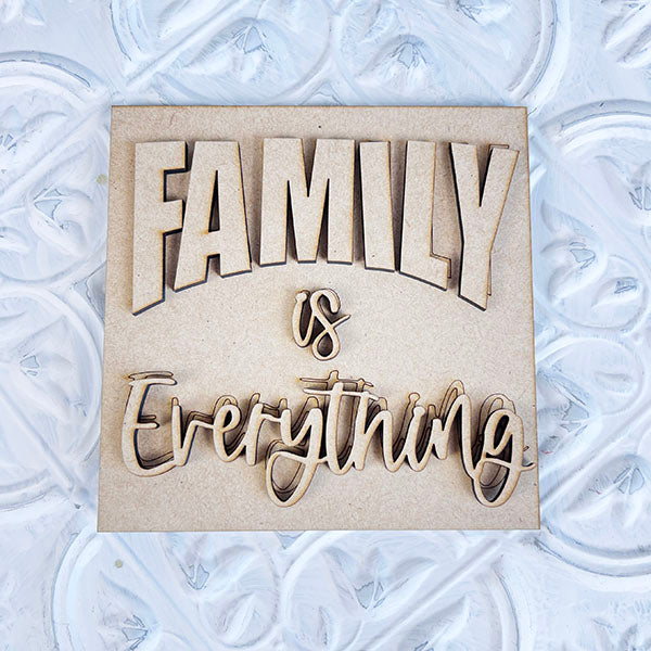 From Janet's Craft Corner, the Home Family Interchangeable Squares decoratively feature the phrase "Family is Everything" carved in 3D against a textured white background, bringing warmth to any space.