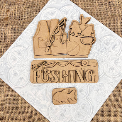 The Gone Fishing Interchangeable Insert by Janet's Craft Corner is a 3-piece DIY seasonal home decor kit with laser-cut wooden pieces—perfect for your crafting projects.