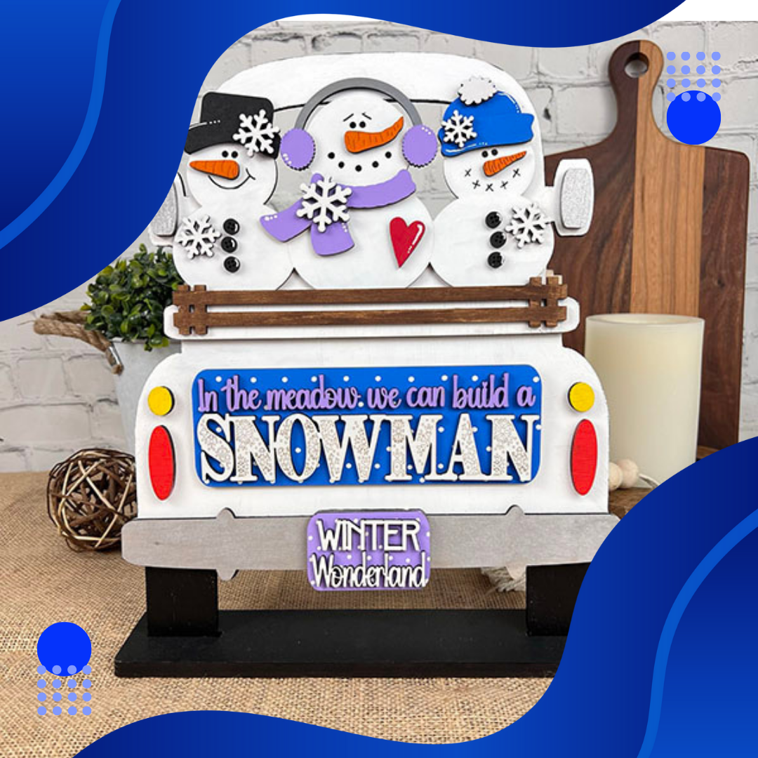 The Snowman Interchangeable Insert DIY craft kit by Janet's Craft Corner features 3 pieces shaped like snowmen and a truck, perfect for adding festive holiday spirit to your kitchen or home decor.