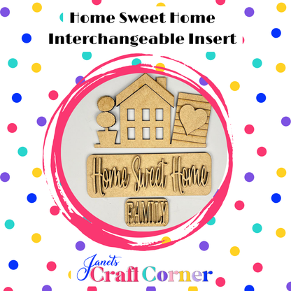 Showcased in a pink circle with colorful dots, Janet's Craft Corner Home Sweet Home Interchangeable Insert DIY kit (set of 3) lets you personalize home decor with house, tree, and "Home Sweet Home" cutouts.