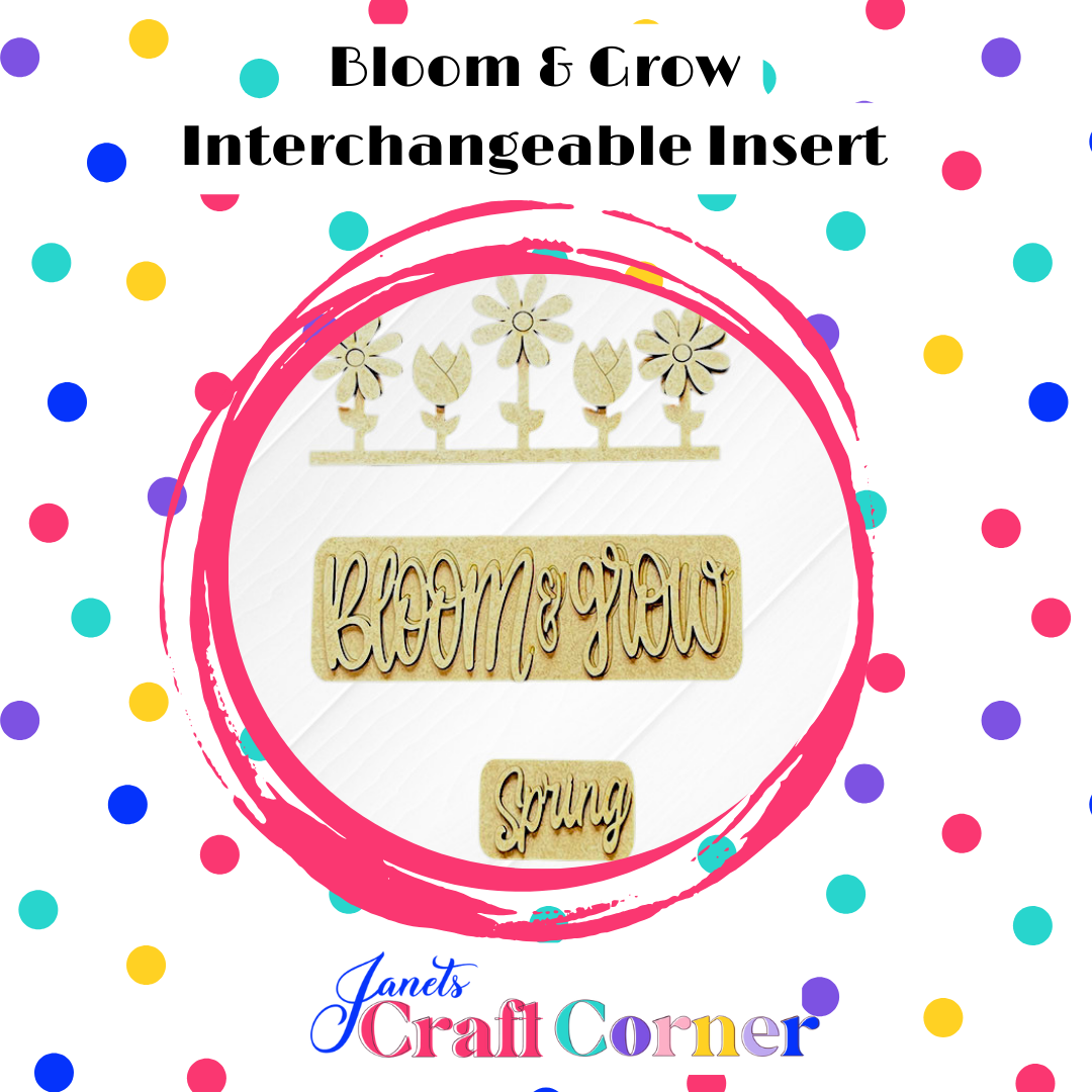A circular image with a pink border displays wooden flower cutouts and plaques saying "Bloom & Grow" and "Spring Blooms" on a polka dot background. At the top, it reads "Bloom & Grow Interchangeable Insert" from Janet's Craft Corner's DIY decor kit of 3 pieces.