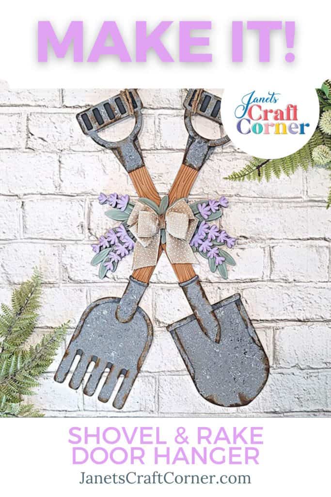 A Shovel and Rake Door Hanger from Janet's Craft Corner, adorned with lavender sprigs at the center, is beautifully displayed on a white brick wall with "Make It!" and "DIY Project" text.