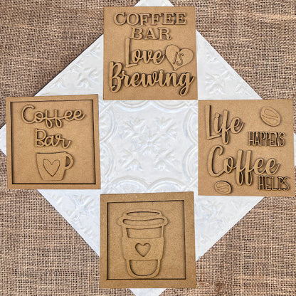 Create your own cozy décor with Janet's Craft Corner Coffee Swappable Squares DIY kit—includes four coffee-themed squares with cutout words like "COFFEE BAR" and "Love is brewing," perfect for seasonal home decorating.