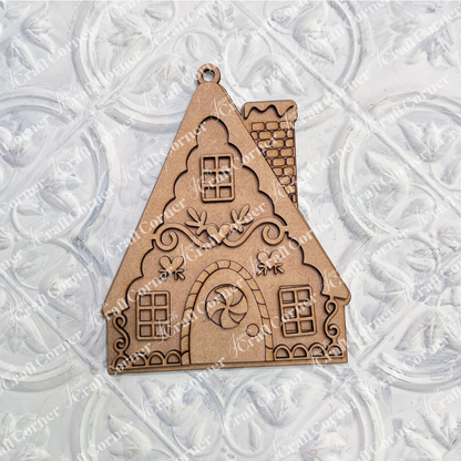 Janet's Craft Corner Gingerbread Ornaments – DIY holiday craft kit – Set of 8, shaped like gingerbread houses with engraved windows, doors, and patterns, ideal for crafting and displayed on a textured white surface.