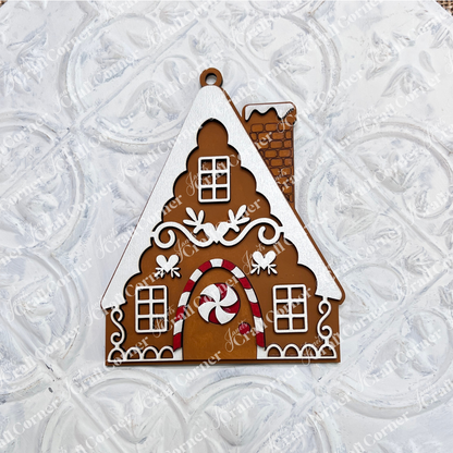 Add charm to your Gingerbread Ornaments collection with Janet's Craft Corner's DIY holiday craft kit—Set of 8 featuring gingerbread houses with white icing, peppermint accents, windows, and snowy roofs, perfect for festive crafts.