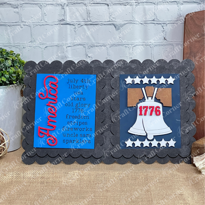 Janet's Craft Corner Patriotic Farmhouse Sign—DIY kit features "America" in red script with patriotic words on one side, Liberty Bell with "1776" on the other. Perfect for tiered trays or seasonal farmhouse displays. Set of 1.