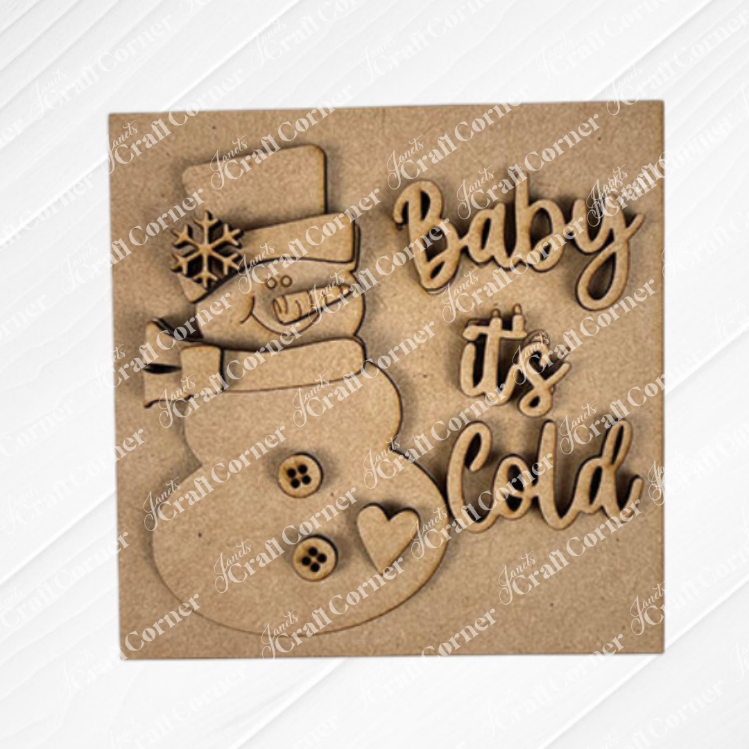 The "Hello Winter Squares" from Janet's Craft Corner is a laser-cut wooden decoration with a smiling snowman and "Baby it's Cold" text—perfect as a DIY craft kit to warm up your tiered tray or seasonal home decor.
