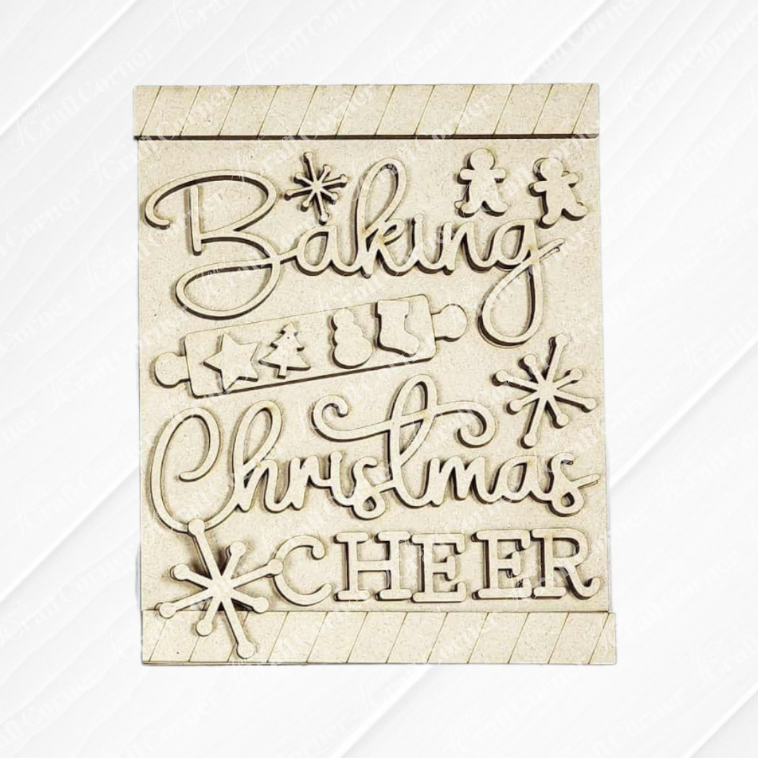 Janet’s Craft Corner’s Christmas Baking Switchable Farmhouse Signs DIY craft kit features festive designs and "Baking Christmas Cheer"—with gingerbread men, cookies, snowflakes, and a rolling pin—to add farmhouse flair to your kitchen.