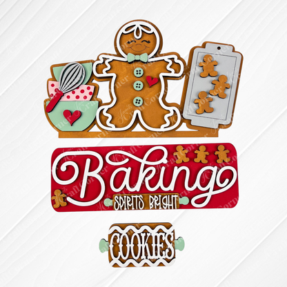 Add a festive touch to your home with the “Baking Spirits Bright Interchangeable Insert” from Janet’s Craft Corner—a DIY seasonal home decor craft kit (1 set of 3 pieces) featuring charming gingerbread cookies, a cheerful gingerbread man, mixing bowl, whisk, cookie sheet with mini cookies, and a “Cookies” sign on a white textured background—ideal for Christmas baking decor or as part of your interchangeable holiday display.