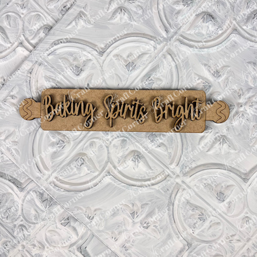 The Vintage Santa Cookies Decor Set DIY craft kit by Janet's Craft Corner features six festive pieces, perfect for tiered trays or adding holiday charm to your home. Displayed on a white, textured background.