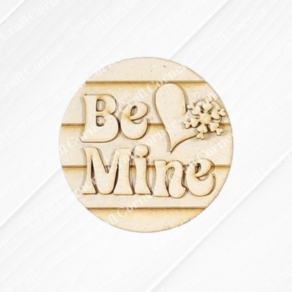 Janet's Craft Corner Be Mine Round Wall Hanger is a DIY seasonal home decor craft kit with “Be Mine,” a heart, and flower design—perfect as a door hanger or creative project. Set of 1.