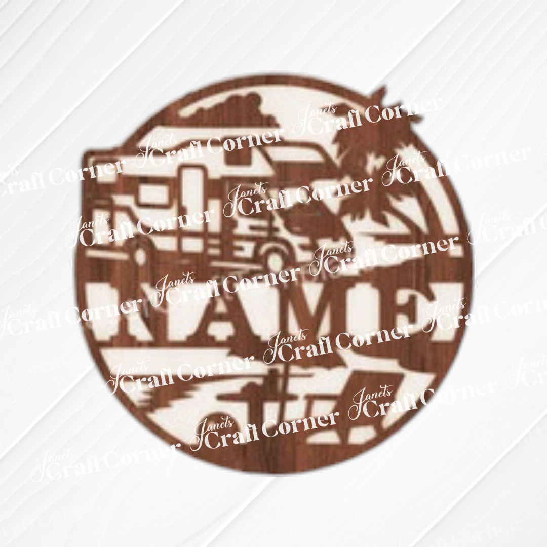 The Nursery Name Wall Hanger by Janet's Craft Corner is a round wooden wall hanger with a cutout tractor, palm tree, and name space. Ideal as an unfinished wood sign or DIY decor kit. "Janet's Craft Corner" watermark on white textured background.