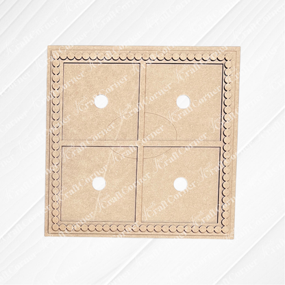 A square piece of brown cardboard from Heartland’s Bead Trim Swappable Squares Frame, featuring four equal sections with center circles, scalloped edges like bead trim, and displayed on a white background with diagonal lines.