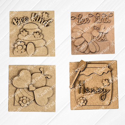 Bee Swappable Squares by Janet's Craft Corner: set of four wooden plaques featuring bee and honey-themed designs, such as flowers, a "Honey" jar, and "Bee Kind" text—handmade charm for your home décor.