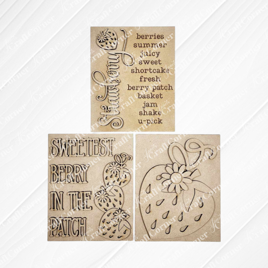 Janet's Craft Corner’s Berry Sweet Switchable Farmhouse Signs – Summer DIY Craft Kit offers a choice of 3 wooden plaques with strawberry motifs, perfect for charming summer décor or as customizable farmhouse signs.