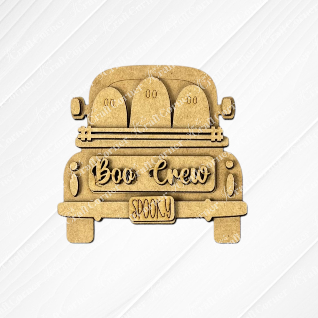 Janet’s Craft Corner Halloween Mini Shelf Sitters is a DIY seasonal home decor craft kit featuring a wooden car with three ghosts, “SPOOKY” license plate, and “Boo Crew” on the trunk—perfect for festive Halloween decorating.