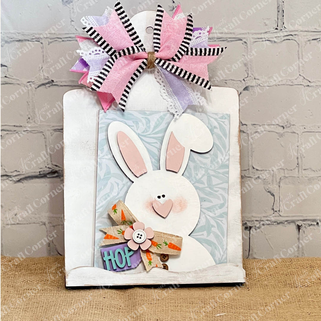 Janet's Craft Corner Breadboard Sign Holder for Switchable Farmhouse Signs is a DIY Home Decor Craft Kit. This set of 1 comes ready to display your farmhouse signs in style, perfect for adding charm to any room.