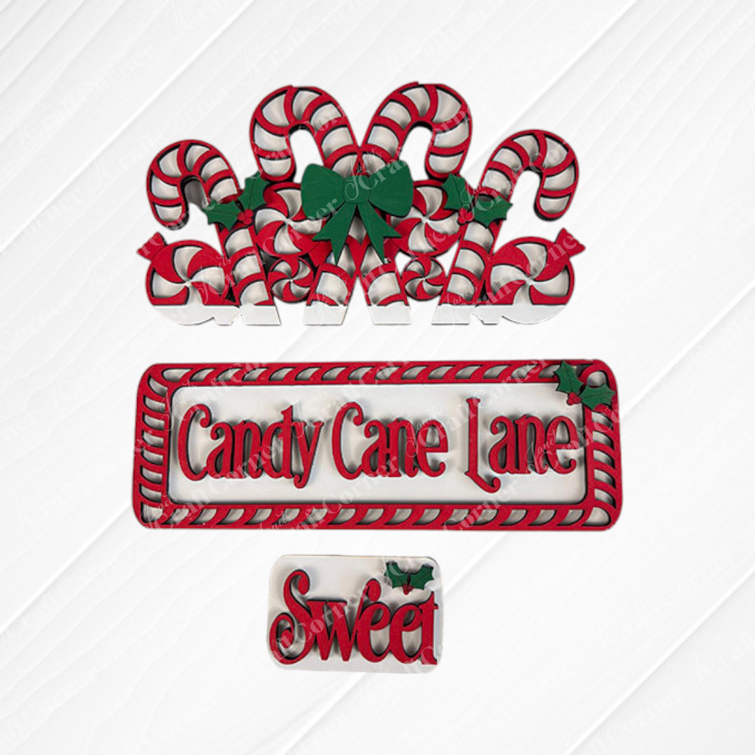 Immerse yourself in the charm of Candy Cane Lane with the festive decorations from Janet's Craft Corner. This DIY home decor kit includes eight candy canes embellished with green bows and holly. A sign displaying "Candy Cane Lane" is framed with red and white stripes, while a smaller "Sweet" sign features holly on a textured background—perfect for your hand-painted projects.