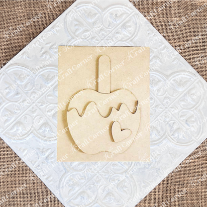Janet's Craft Corner – Sample painted set of Apple Cider Switchable Farmhouse Signs are DIY seasonal home decor kits with a fall apple theme. One features the wood cut-out word “Cider Season” with words that evoke the scent of apples in the air, another features a caramel apple complete with heart and the last features an antique truck with a load of apples.