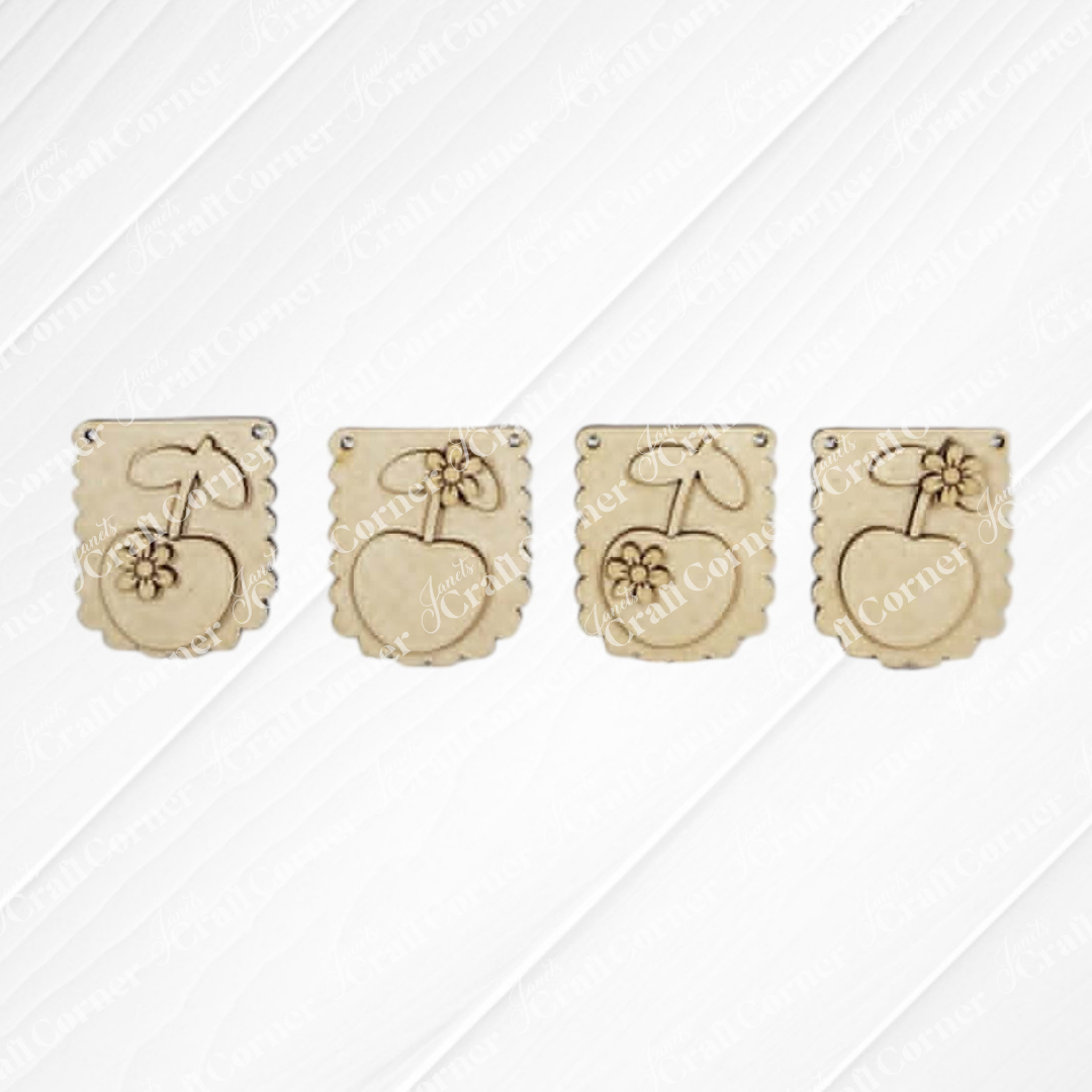 The Cherry Decor Set by Janet's Craft Corner features four beige wooden tags with engraved fruit and flower designs—ideal for farmhouse accents or a DIY home decor kit.