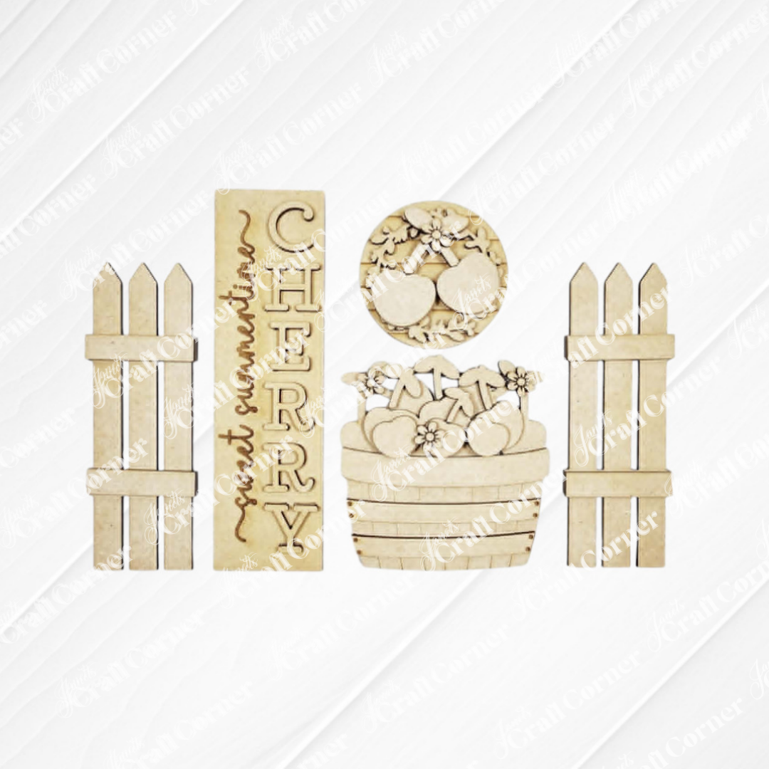 The Cherry Interchangeable Porch Set by Janet's Craft Corner features farmhouse-style wooden cutouts: a "CHERRY" sign, round cherry piece, cherry basket with flowers, and two picket fences—ideal for DIY seasonal home decor inserts.