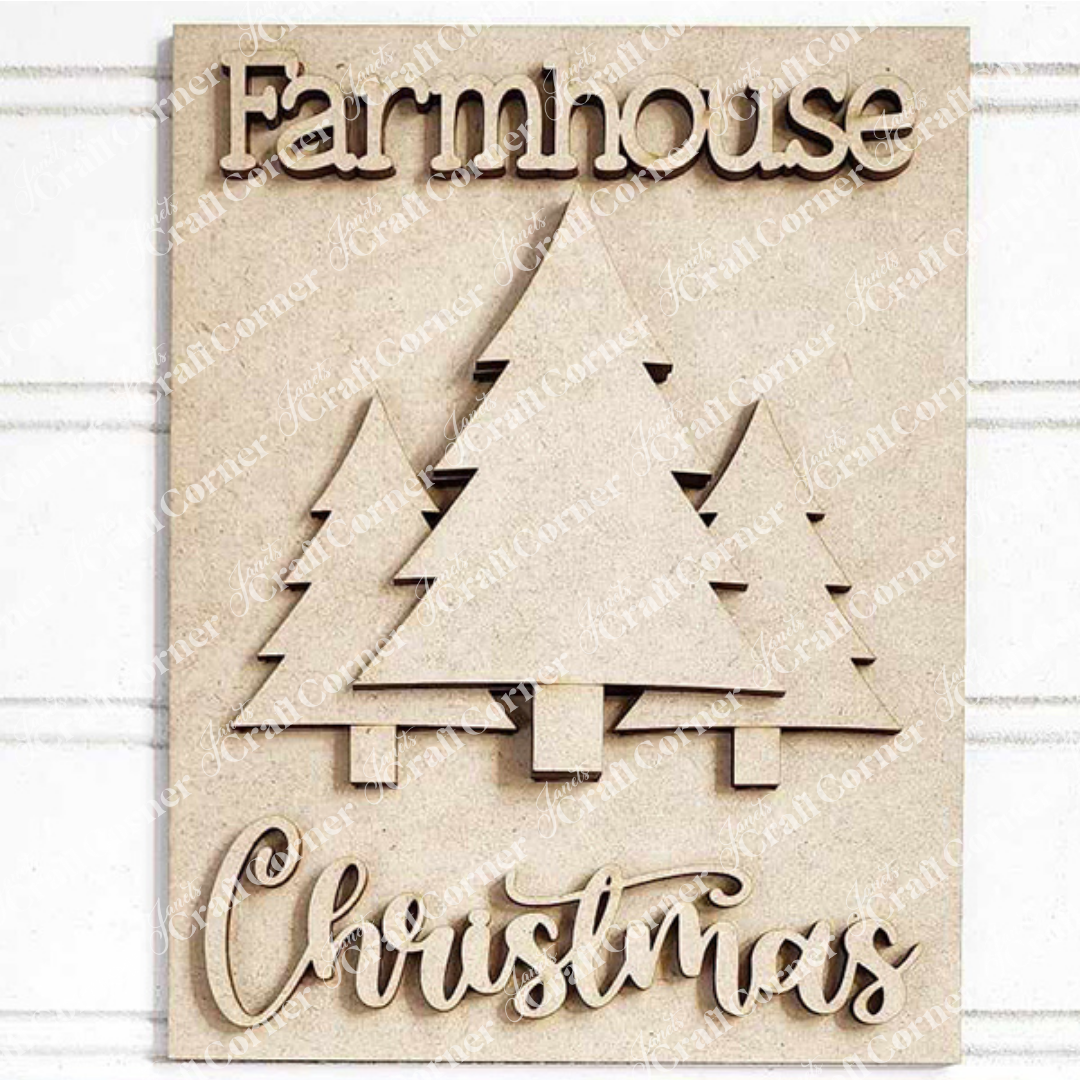 The Christmas Trees Switchable Farmhouse Sign from Janet's Craft Corner displays the phrase "Farmhouse Christmas" surrounding three carved trees set against a pale wood background, making it an ideal choice for DIY home decor enthusiasts.