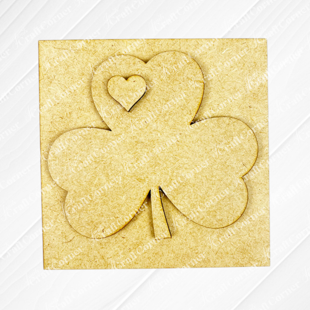 The St Patricks Squares by Janet's Craft Corner is a square wooden cut-out with a three-leaf clover and heart detail—ideal for tiered tray decor or adding to your Swappable Squares collection.