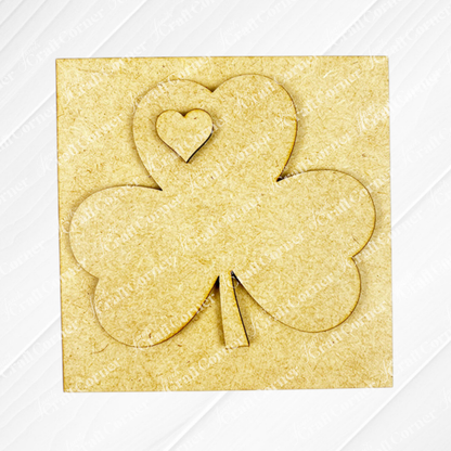 The St Patricks Squares by Janet's Craft Corner is a square wooden cut-out with a three-leaf clover and heart detail—ideal for tiered tray decor or adding to your Swappable Squares collection.