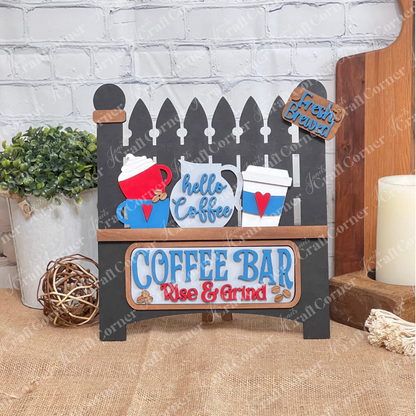 Janet's Craft Corner Coffee Bar Interchangeable Insert is a DIY seasonal home decor craft kit featuring 3 decorative cup pieces with coffee-themed text—perfect for kitchen or coffee bar décor.
