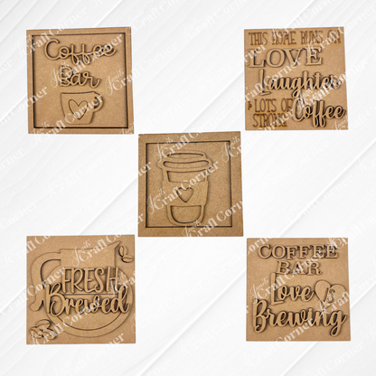 Set of five "Coffee Bar Swappable  Squares" by Janet's Craft Corner—square and rectangular wooden plaques with coffee-themed designs like "Love, Laughter, Coffee." Ideal for DIY home decor or adding charm to small spaces. Displayed on a white background.