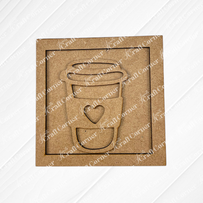 Coffee Bar Swappable Squares by Janet's Craft Corner: A brown square cardboard with a to-go coffee cup cutout featuring a heart on the sleeve—ideal for DIY home decor. Set against a white, textured, decorative background.
