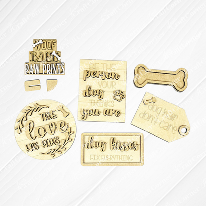 The Dog Lover Decor Set by Janet's Craft Corner is a DIY home decor craft kit featuring 6 wooden plaques and tags with dog-themed phrases like "Be the person your dog thinks you are" and "Dog hair don't care," plus paw print designs, perfect for celebrating that true love has paws.
