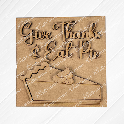 Janet's Craft Corner's Thanksgiving Feast Squares features "Give Thanks & Eat Pie" above a pie slice with whipped cream—perfect tiered tray decor for your fall display.