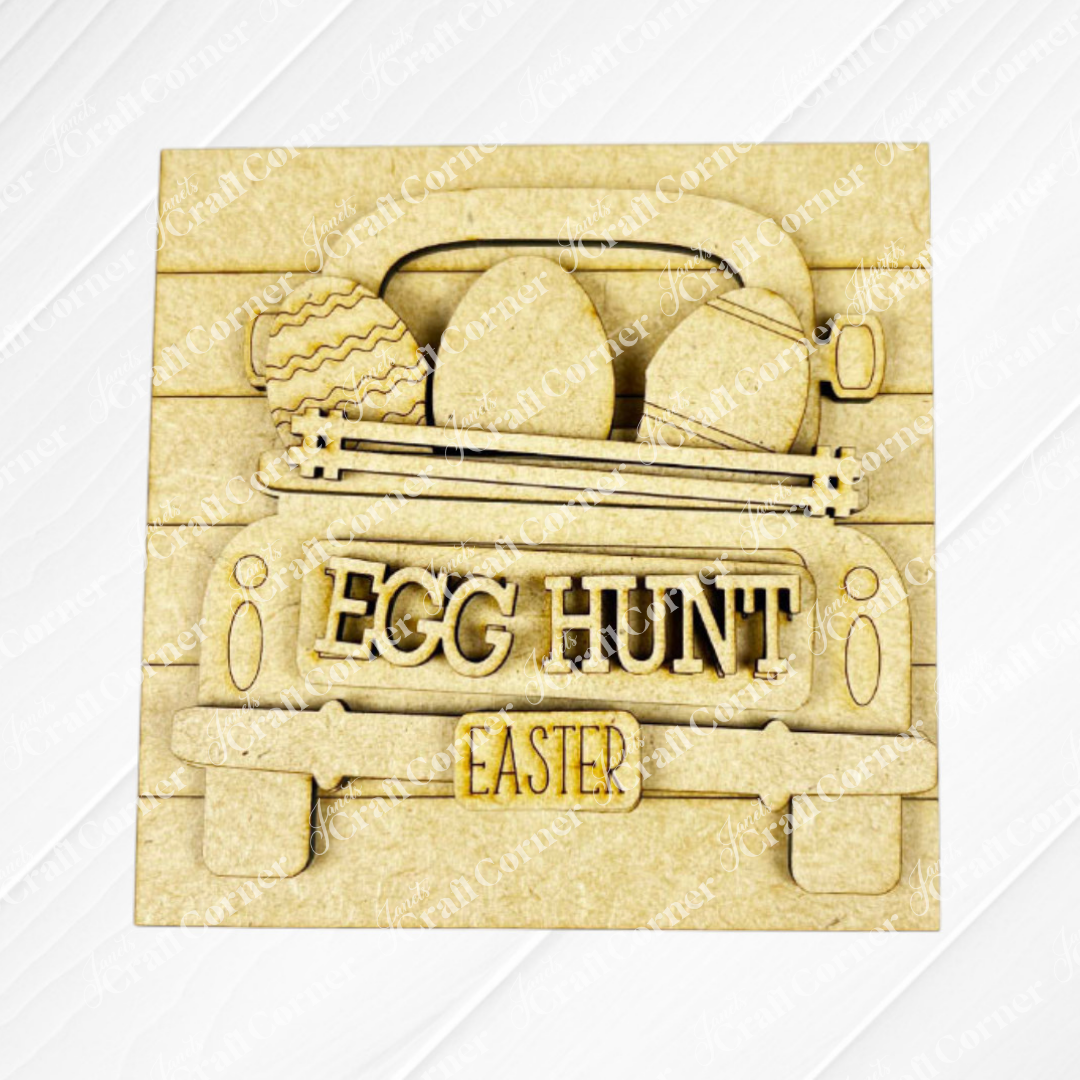 Hello Easter Squares by Janet's Craft Corner features a layered wood truck with Easter eggs, "EGG HUNT" on the tailgate, and "EASTER" on the license plate—a perfect DIY craft kit to add festive charm to your celebration.