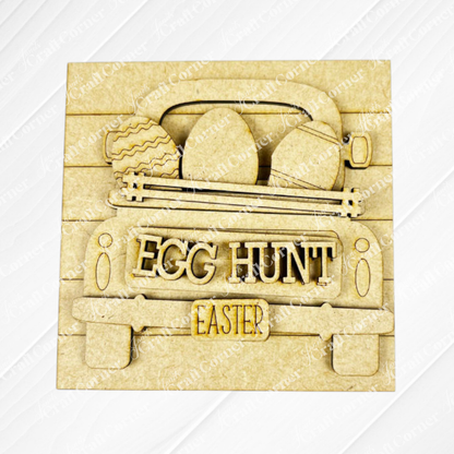 Hello Easter Squares by Janet's Craft Corner features a layered wood truck with Easter eggs, "EGG HUNT" on the tailgate, and "EASTER" on the license plate—a perfect DIY craft kit to add festive charm to your celebration.