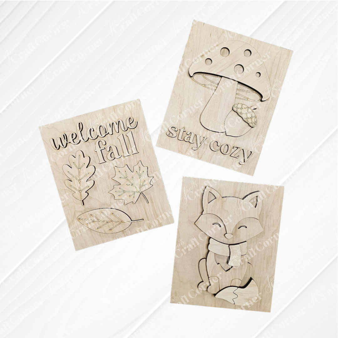 Janet's Craft Corner Fall in the Forest Switchable Farmhouse Signs kit includes three charming woodland plaques—“welcome fall” with leaves, a cozy mushroom, and a peaceful fox—perfect DIY seasonal decor for your home.